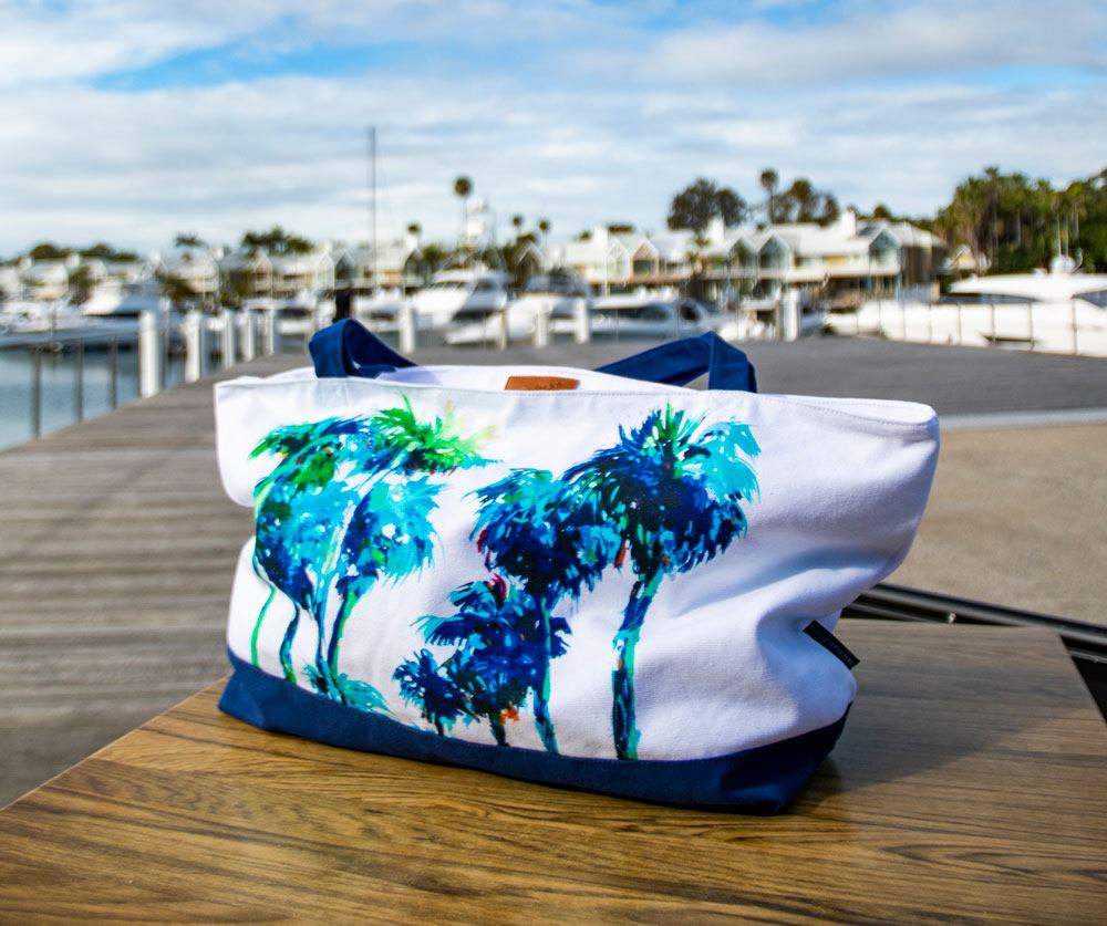 Dalozzo Art Beach Bag Displayed On A Marina Coffee Table