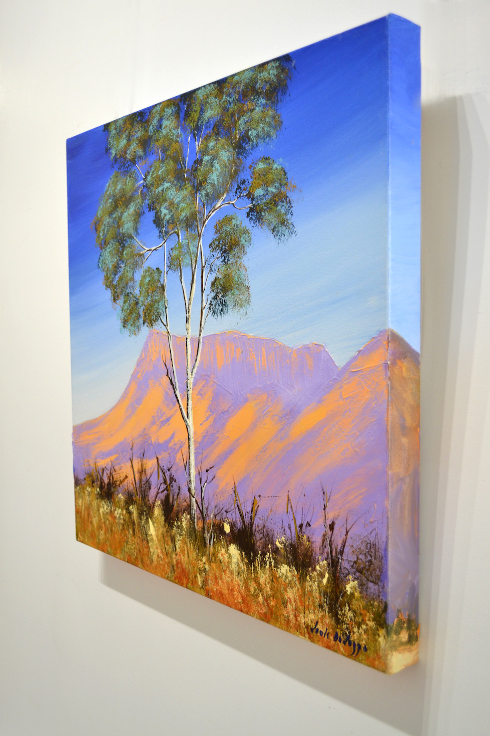 Side View Of Landscape Painting "Ghost Gum near Alice" By Louis Dalozzo