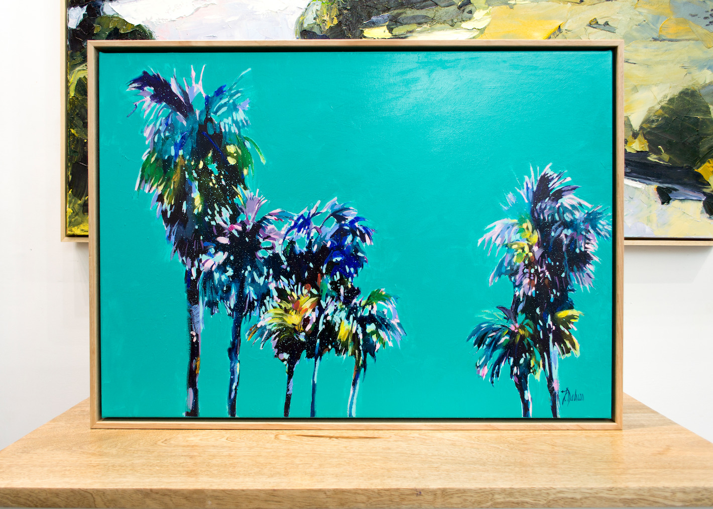 Framed Front View Of Landscape Painting "Sanctuary Palms Azure" By Judith Dalozzo