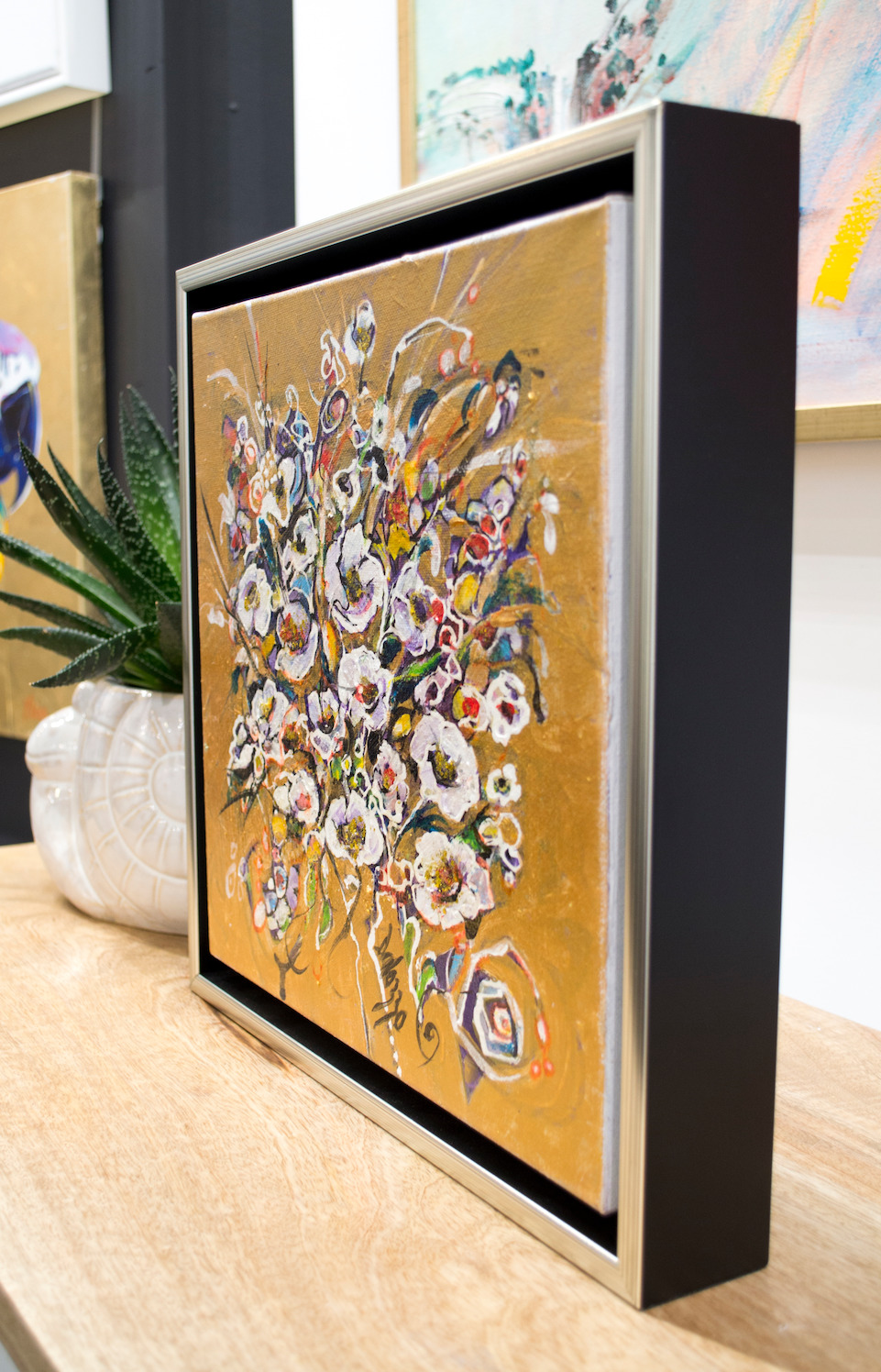Framed Side View Of Still Life Painting "Wild Flowers Golden" By Lucette Dalozzo